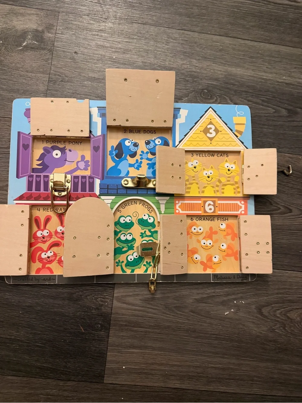 Melissa & Doug Colorful Lockboard - Rainbow Activity Puzzle